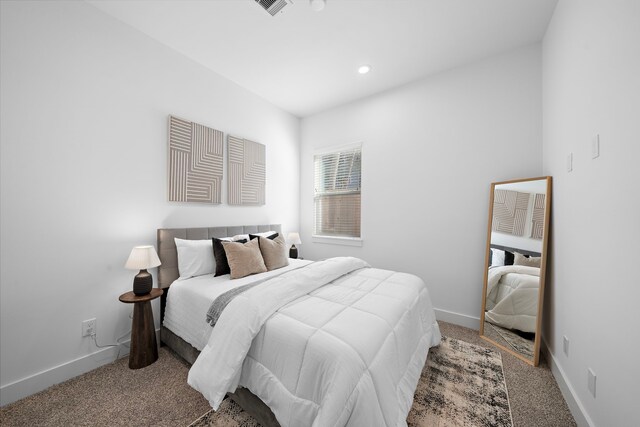 845 Elkhart St Unit C, Houston, TX 77091 - bedroom featuring light colored carpet, baseboards, and recessed lighting
