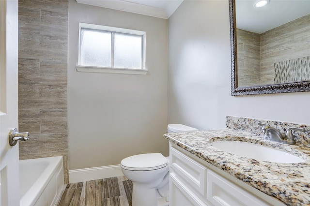 2510 Cobble Ridge Dr, Sugar Land, TX 77498 - bathroom with vanity, toilet, and baseboards