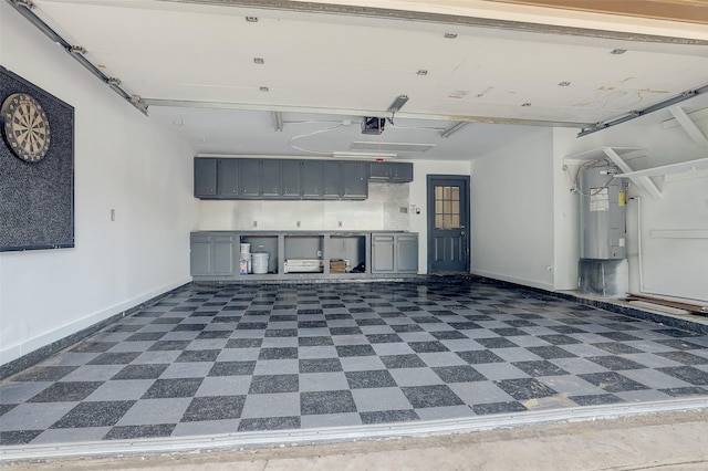 2510 Cobble Ridge Dr, Sugar Land, TX 77498 - garage with water heater, baseboards, and a garage door opener