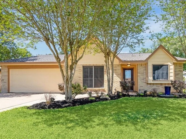 2510 Cobble Ridge Dr, Sugar Land, TX 77498 - ranch-style home with an attached garage, a front lawn, concrete driveway, and brick siding