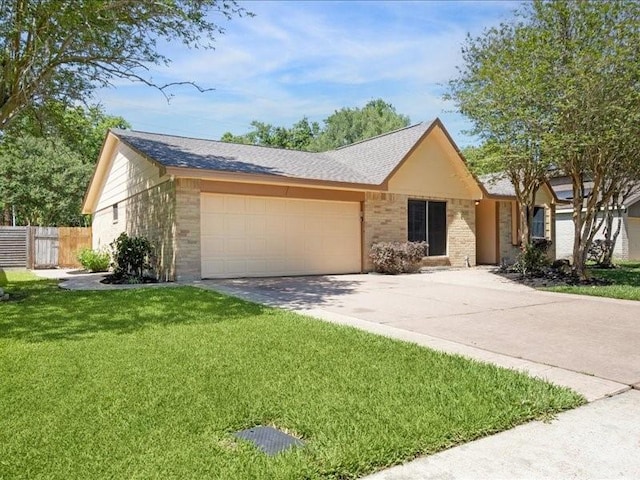 2510 Cobble Ridge Dr, Sugar Land, TX 77498 - ranch-style home featuring an attached garage, brick siding, driveway, and a shingled roof