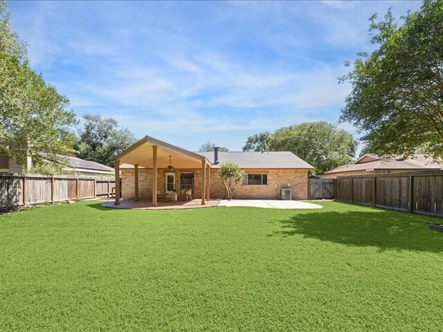 2510 Cobble Ridge Dr, Sugar Land, TX 77498 - back of house featuring a patio, a ceiling fan, and cooling unit