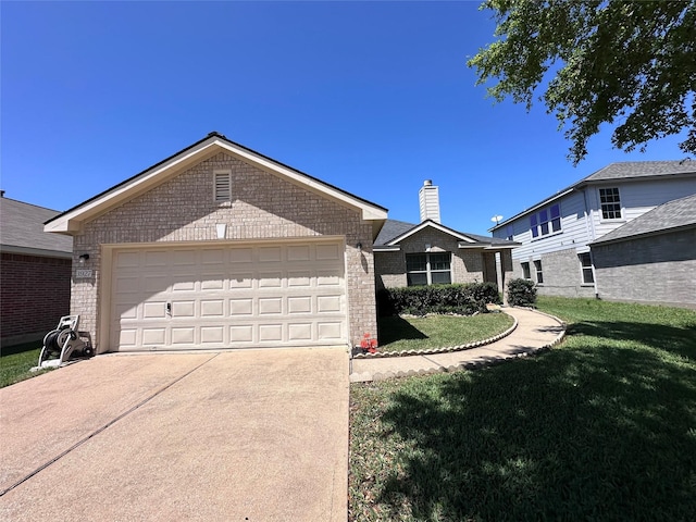 ranch-style home featuring a chimney, a front lawn, concrete driveway, brick siding, and a garage