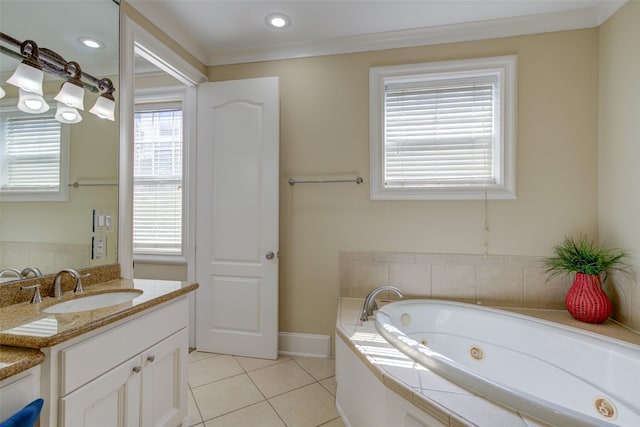 bathroom with baseboards, a tub with jets, tile patterned flooring, and vanity