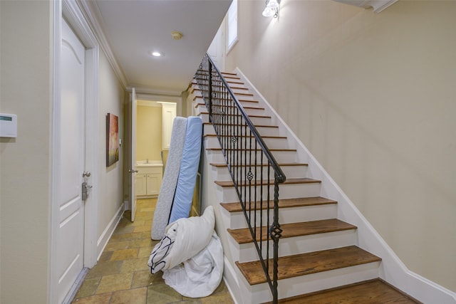 stairs with baseboards, recessed lighting, and stone tile flooring
