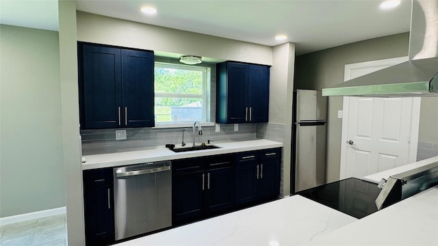 1434 County Road 878a, Sweeny, TX 77480 - kitchen featuring appliances with stainless steel finishes, a sink, wall chimney exhaust hood, tasteful backsplash, and light countertops