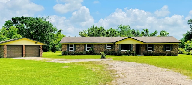 1434 County Road 878a, Sweeny, TX 77480 - ranch-style house with a garage, a front lawn, and brick siding