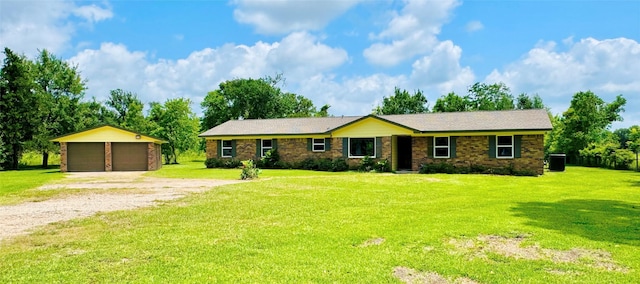 1434 County Road 878a, Sweeny, TX 77480 - ranch-style house featuring an outbuilding, a detached garage, a front lawn, and central air condition unit
