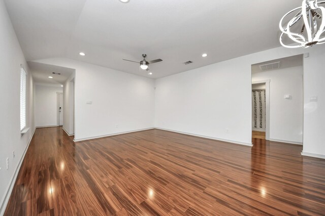 2906 Chase Cross Ln, Houston, TX 77047 - spare room featuring a chandelier, recessed lighting, wood finished floors, a ceiling fan, and baseboards