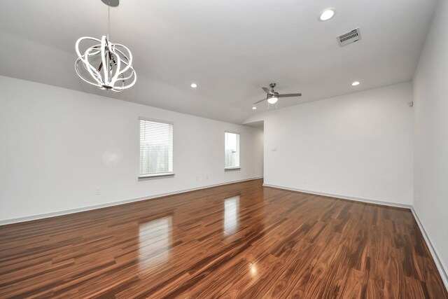 2906 Chase Cross Ln, Houston, TX 77047 - unfurnished room featuring a chandelier, ceiling fan, recessed lighting, wood finished floors, and baseboards