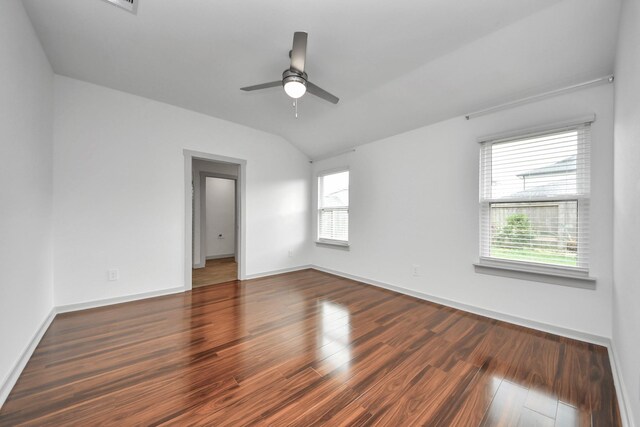2906 Chase Cross Ln, Houston, TX 77047 - spare room featuring wood finished floors, a ceiling fan, baseboards, and vaulted ceiling