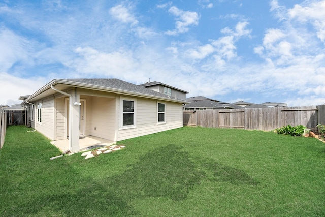 2906 Chase Cross Ln, Houston, TX 77047 - back of house with a patio and roof with shingles