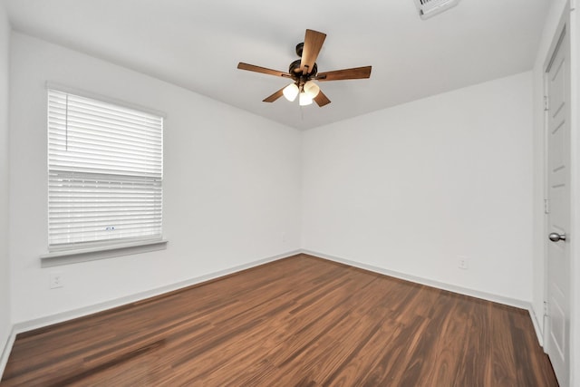 2906 Chase Cross Ln, Houston, TX 77047 - empty room featuring ceiling fan, wood finished floors, and baseboards