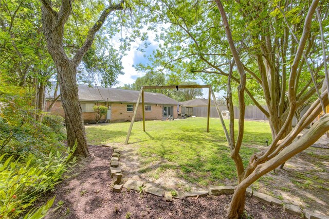 9534 Meadowglen Ln, Houston, TX 77063 - view of yard featuring fence