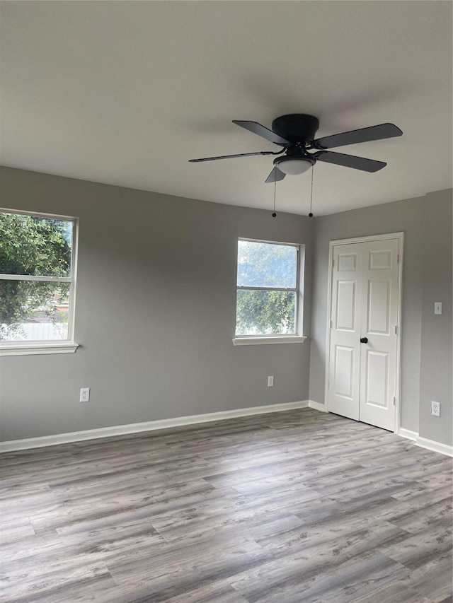 7307 Adelbert St, Houston, TX 77093 - unfurnished bedroom featuring wood finished floors and ceiling fan