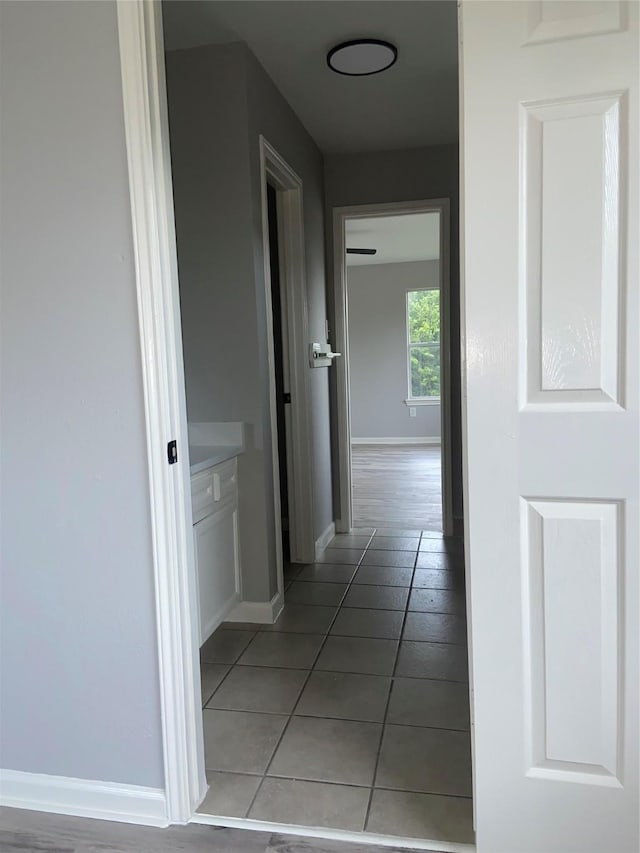 7307 Adelbert St, Houston, TX 77093 - hallway featuring baseboards and light tile patterned floors