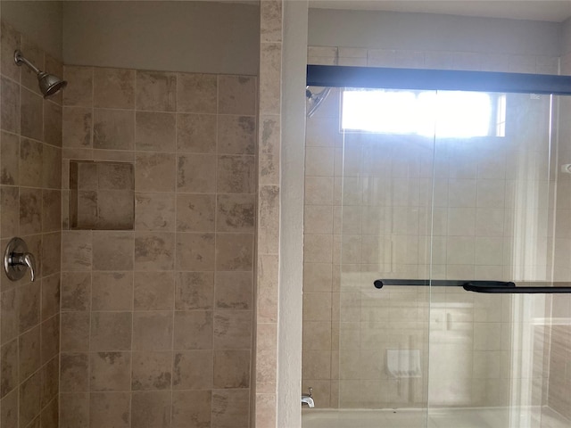 7307 Adelbert St, Houston, TX 77093 - bathroom featuring a tile shower