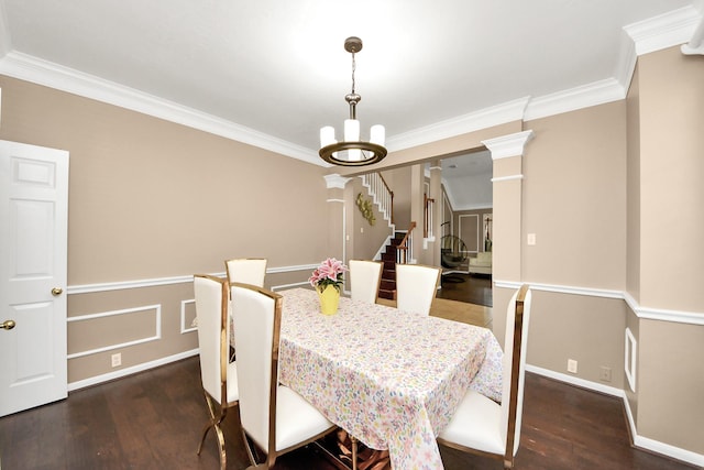 dining room featuring crown molding, stairs, wood finished floors, a chandelier, and baseboards