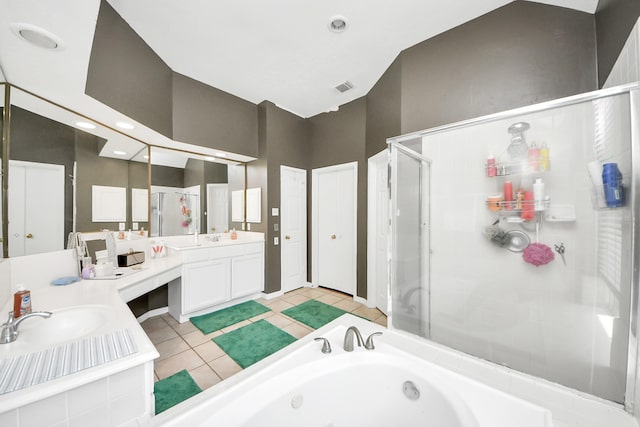 full bathroom with a shower stall, tile patterned flooring, a garden tub, double vanity, and recessed lighting