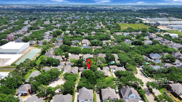 aerial view of property's location featuring nearby suburban area