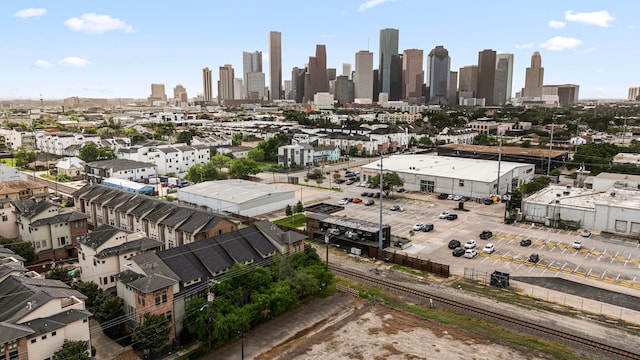 birds eye view of property with a city view