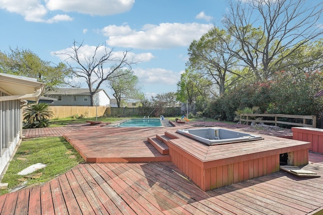 5347 Inwood Dr, Katy, TX 77493 - deck featuring a jacuzzi, a fenced backyard, and a fenced in pool