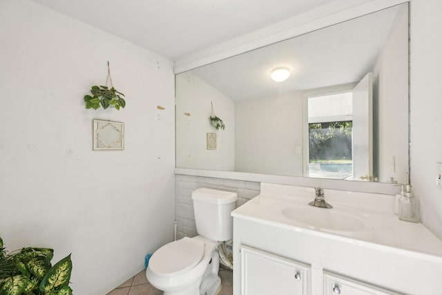 5347 Inwood Dr, Katy, TX 77493 - bathroom featuring tile patterned floors, toilet, and vanity