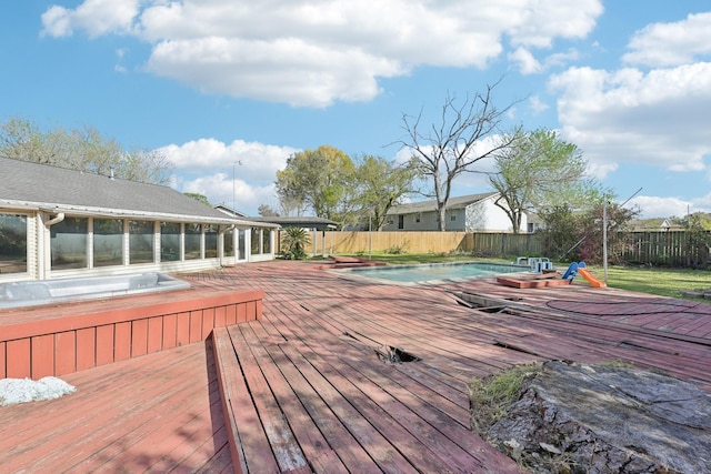 5347 Inwood Dr, Katy, TX 77493 - wooden deck featuring a fenced backyard and a fenced in pool