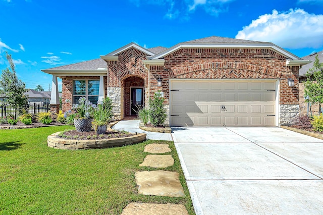 ranch-style house featuring concrete driveway, a front lawn, brick siding, a garage, and fence