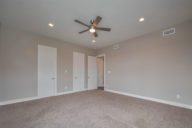 1305 Laird St, Houston, TX 77008 - unfurnished bedroom featuring carpet, recessed lighting, baseboards, multiple closets, and ceiling fan