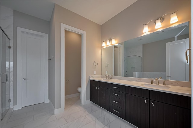 1305 Laird St, Houston, TX 77008 - bathroom with a stall shower, marble look tiles, toilet, baseboards, and double vanity