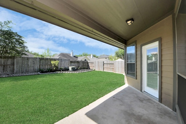 view of yard featuring a fenced backyard and a patio