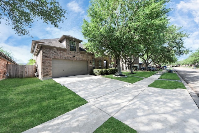 view of front of property with driveway, a front yard, a garage, and brick siding