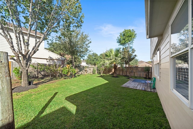 21355 Bella Mountain Dr, Spring, TX 77379 - view of yard featuring a fenced backyard and a deck