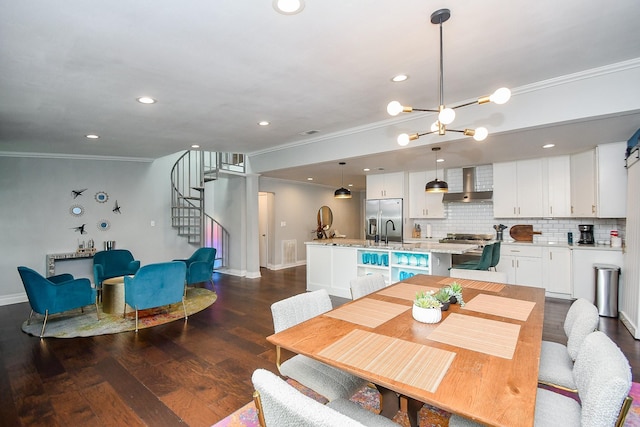 5902 Hummingbird St, Houston, TX 77096 - dining room featuring ornamental molding, stairway, baseboards, dark wood-type flooring, and recessed lighting