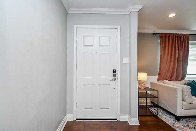 5902 Hummingbird St, Houston, TX 77096 - entryway with crown molding, dark wood finished floors, baseboards, and recessed lighting