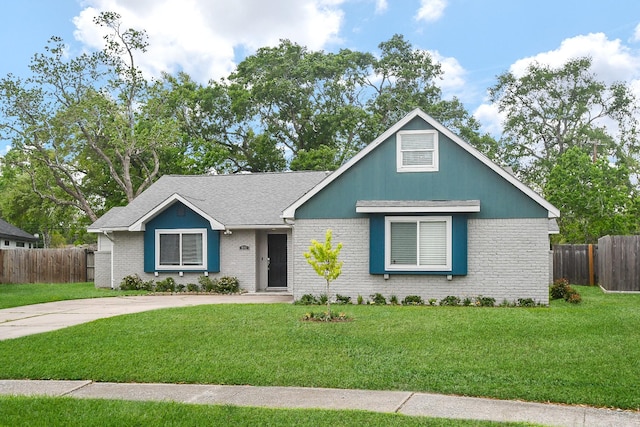 5902 Hummingbird St, Houston, TX 77096 - view of front of property with brick siding and roof with shingles