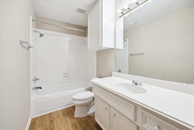 4422 Castle Court Pl, Houston, TX 77006 - full bathroom featuring wood finished floors, vanity, and bathtub / shower combination