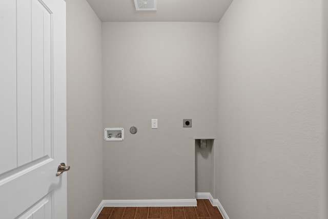 clothes washing area with hookup for an electric dryer, baseboards, washer hookup, and dark wood-style floors