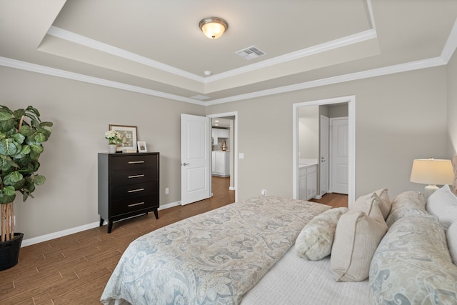 bedroom with a raised ceiling, dark wood-type flooring, crown molding, and baseboards