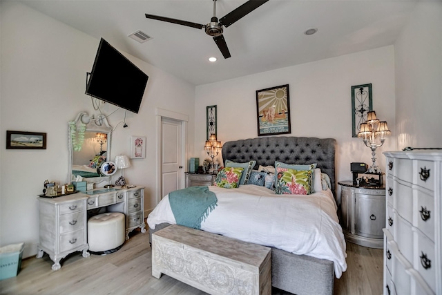 bedroom featuring light wood-type flooring, a ceiling fan, visible vents, and recessed lighting
