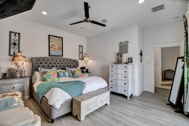 bedroom with light wood finished floors, ceiling fan, visible vents, and recessed lighting