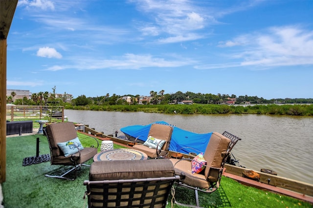 dock area with a water view