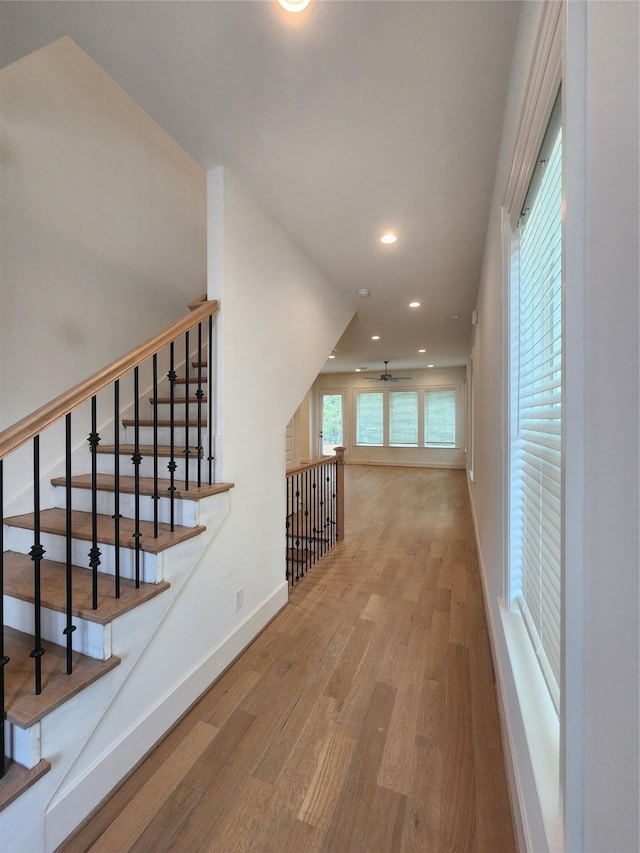 409 Forest Reserve Pl, Houston, TX 77079 - hall with wood finished floors, baseboards, and recessed lighting