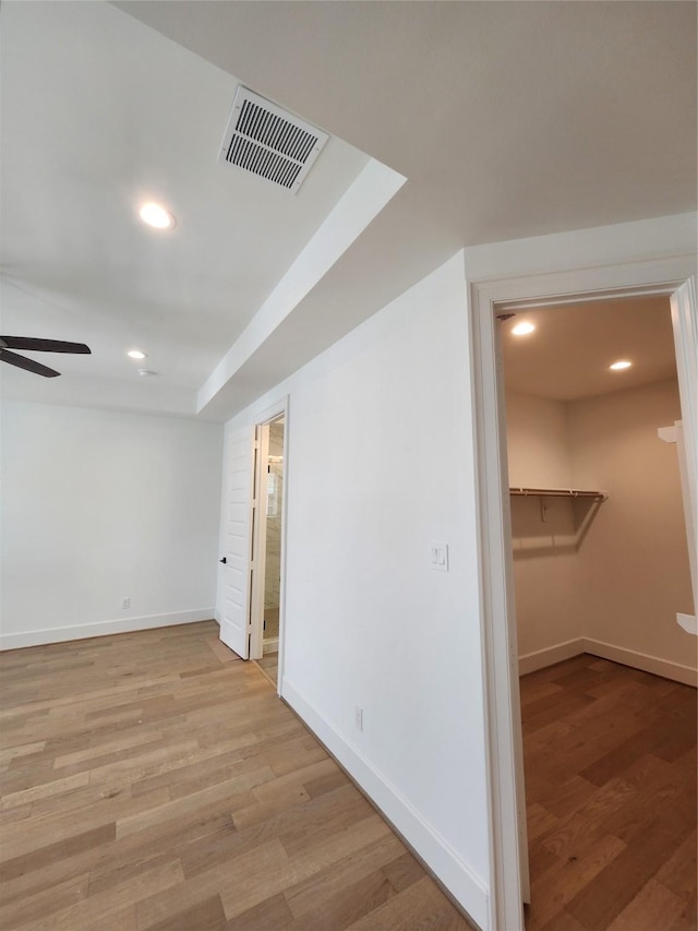 409 Forest Reserve Pl, Houston, TX 77079 - unfurnished room featuring baseboards, ceiling fan, light wood finished floors, and recessed lighting