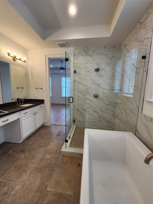 409 Forest Reserve Pl, Houston, TX 77079 - bathroom with a shower stall, vanity, and a tray ceiling