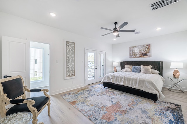 8132 Brandon St, Houston, TX 77051 - bedroom featuring french doors, access to exterior, multiple windows, and visible vents