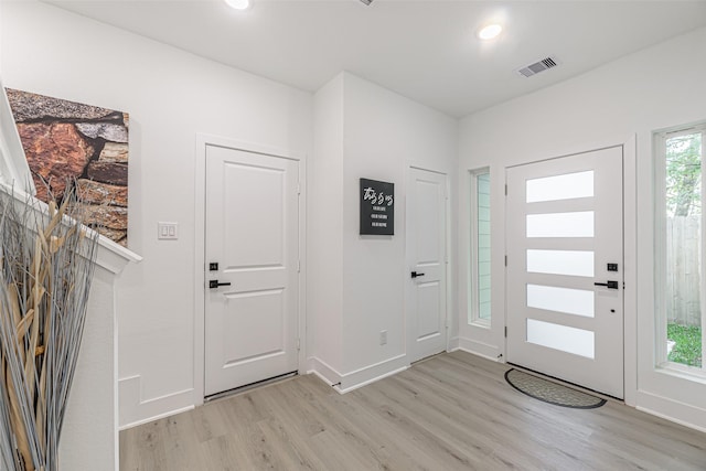 8132 Brandon St, Houston, TX 77051 - entrance foyer featuring visible vents, baseboards, light wood finished floors, and recessed lighting