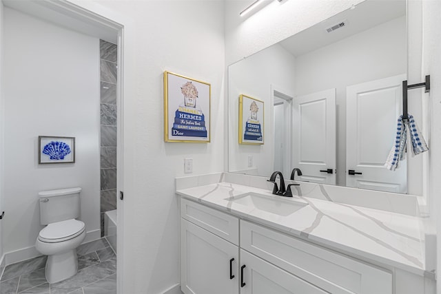 8132 Brandon St, Houston, TX 77051 - bathroom featuring visible vents, baseboards, toilet, vanity, and marble finish floor