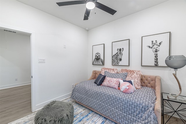 8132 Brandon St, Houston, TX 77051 - bedroom featuring wood finished floors, ceiling fan, baseboards, and visible vents